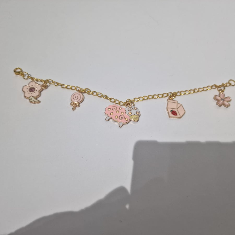  Unique mixed charm gold bracelet