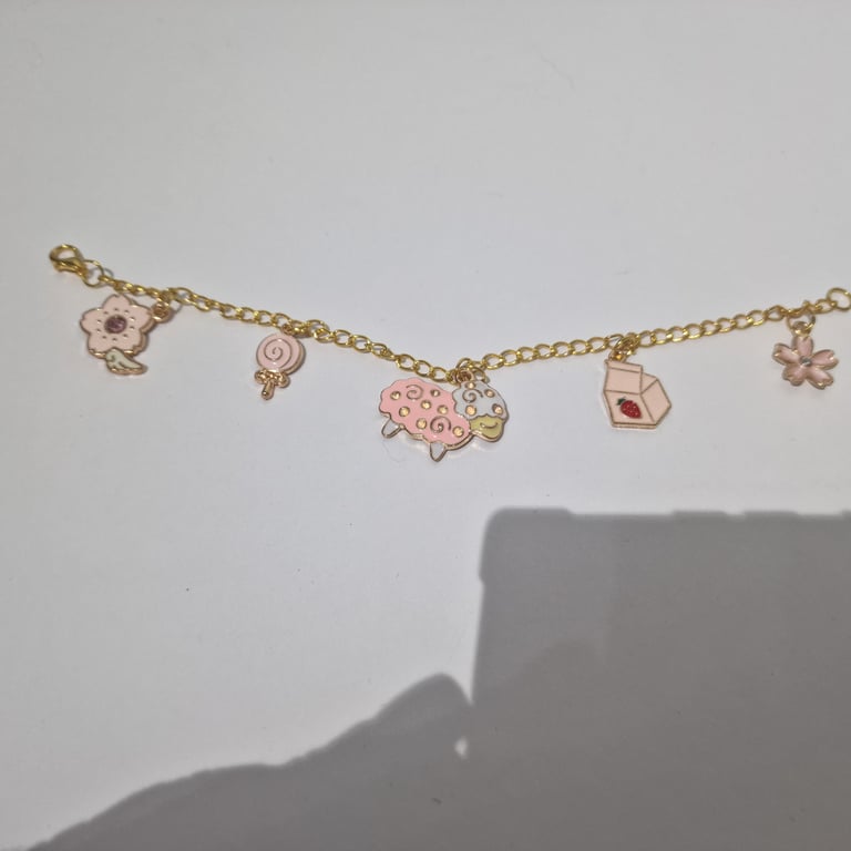  Unique mixed charm gold bracelet