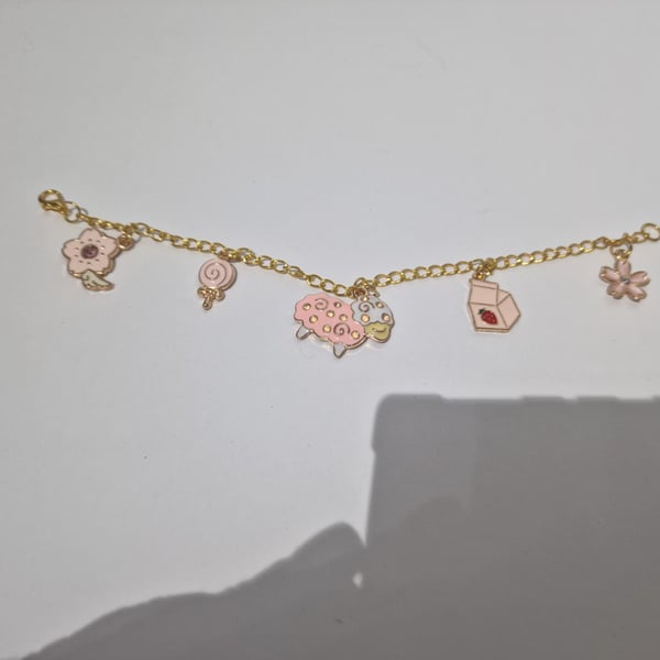  Unique mixed charm gold bracelet
