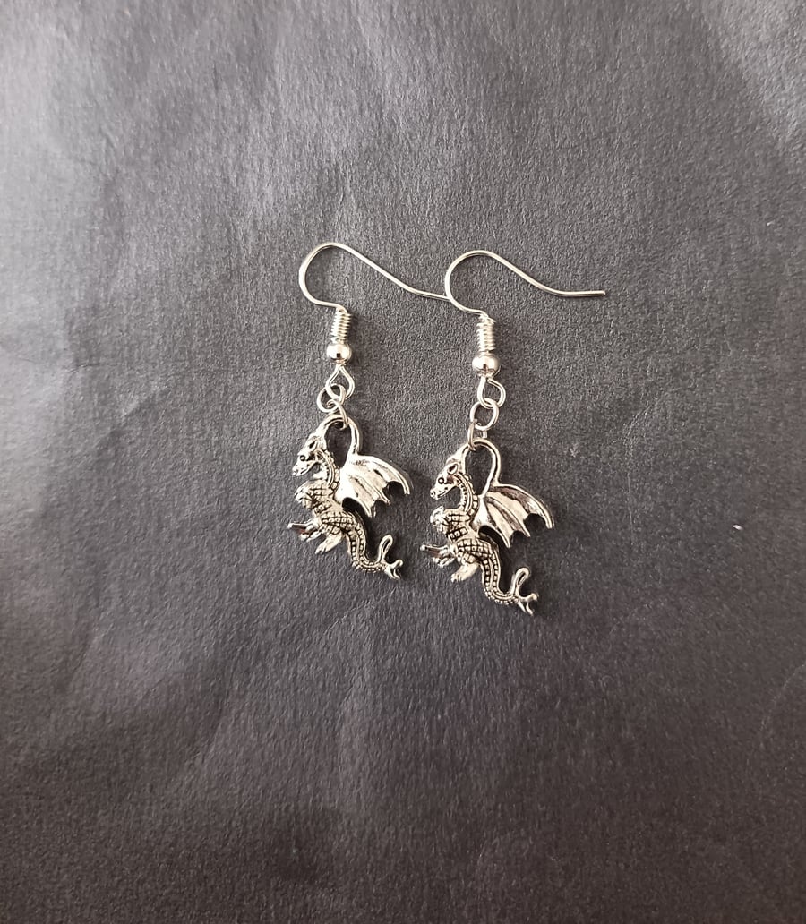 Silver dragon charm dangle earrings 