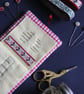 Patchwork stripe needle case made from Tilda fabric in shades of red and natural - Image 5
