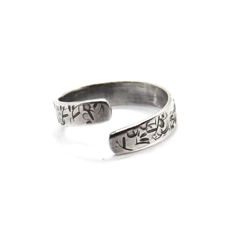 Solid silver patterned wrap ring