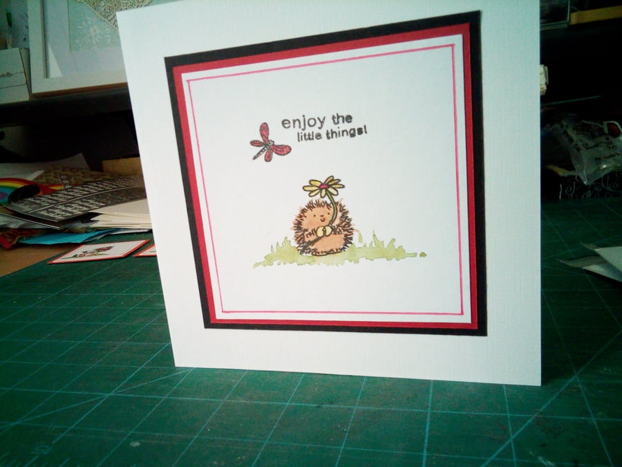 Cute hedgehog with flower birthday card 