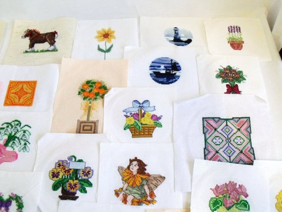 huge collection of a variety of cross stitch pieces for you to upcycle or frame