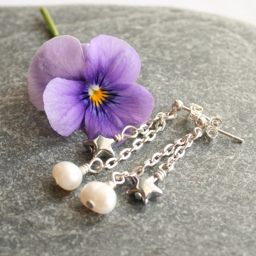 Long pearl and silver star earrings