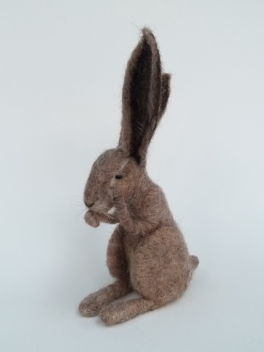 Needle-felted hare, wool sculpture, grooming hare