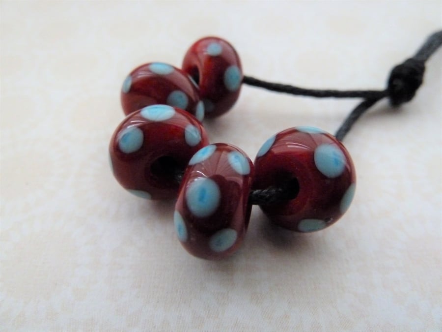 red and blue polka dot lampwork beads