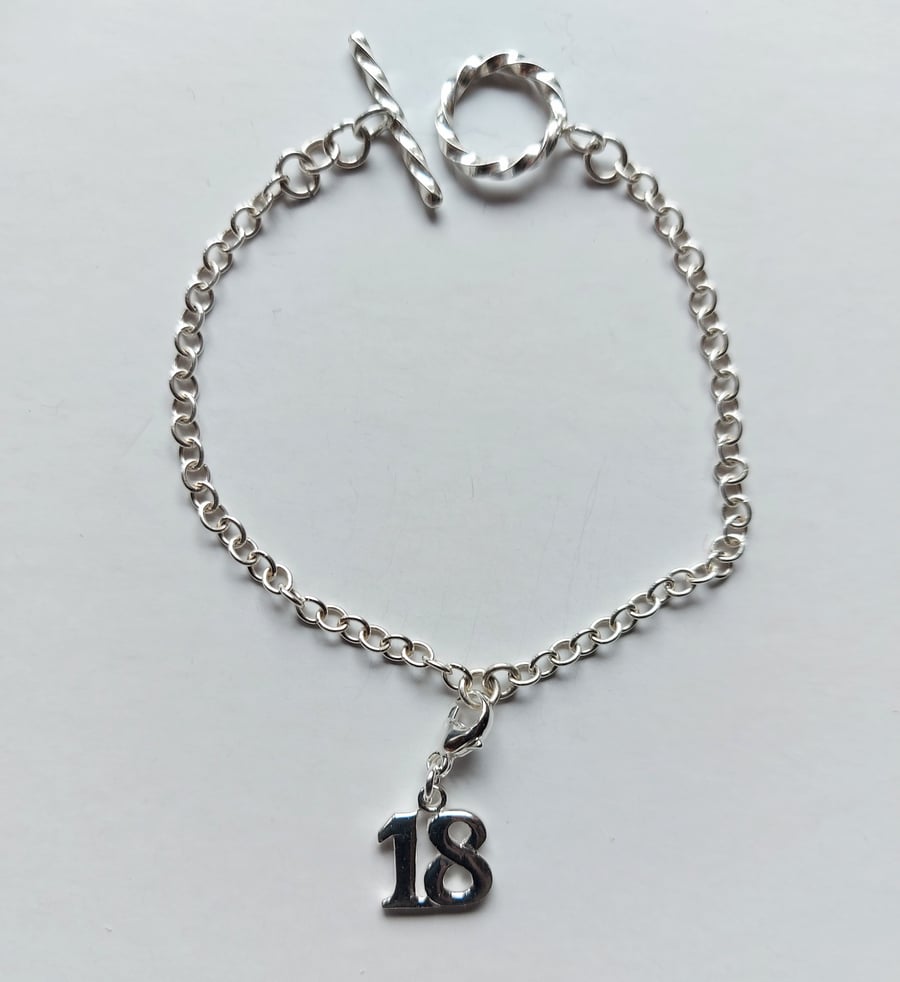 Sterling silver chain bracelet with 18th birthday charm