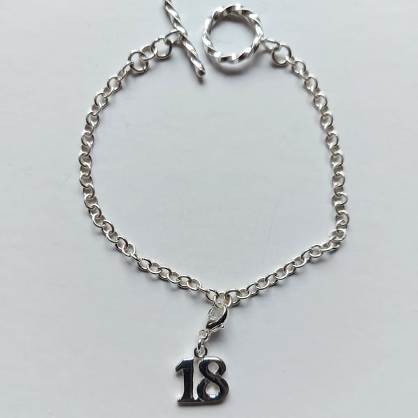 Sterling silver chain bracelet with 18th birthday charm