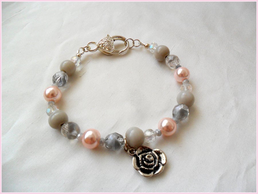 Pink and grey bead bracelet
