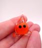 small orange glass wisp figure - Image 2