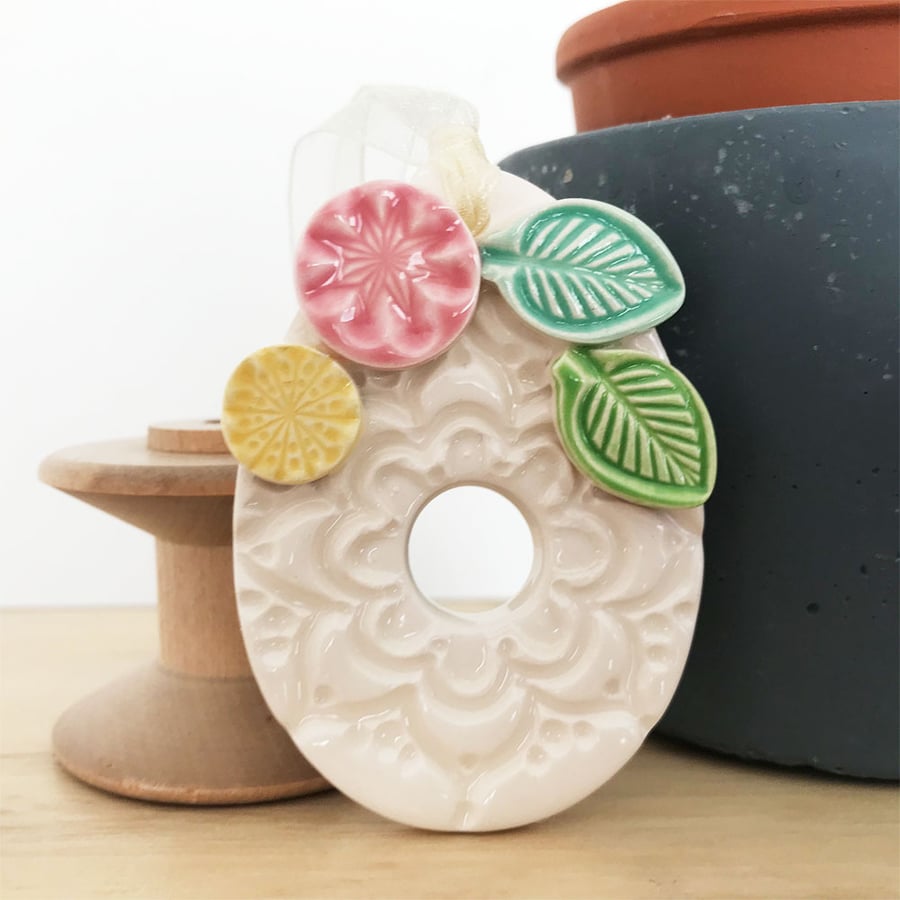 Pottery Easter Egg decoration with leaves and flowers