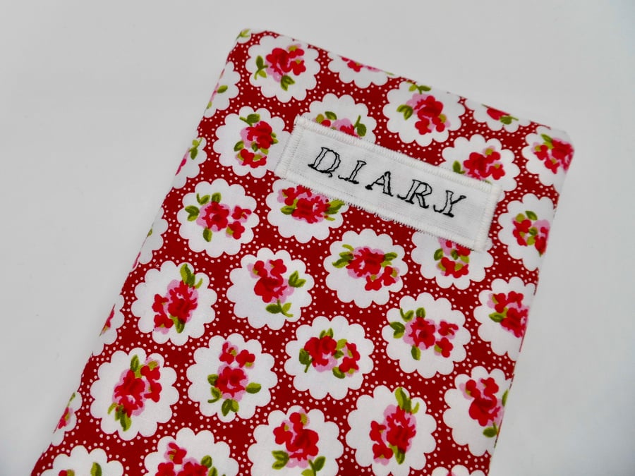 Diary with red floral slip cover