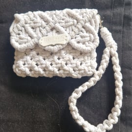 Purse with detachable wrist strap