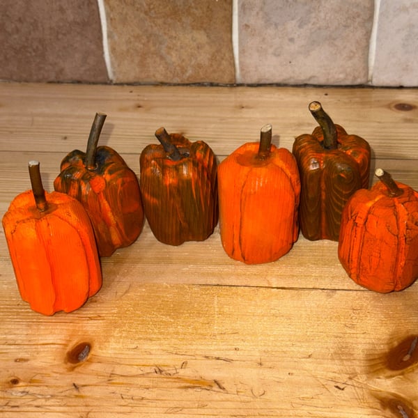Rustic hand carved pumpkins. two sets of 6, price per set.