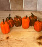 Rustic hand carved pumpkins. two sets of 6, price per set.