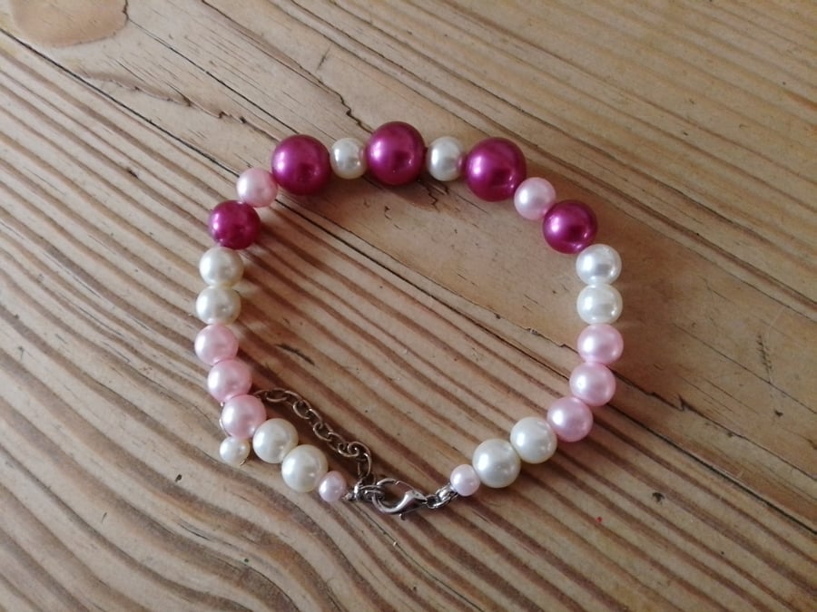 Handmade bracelet made using pre-loved beads.
