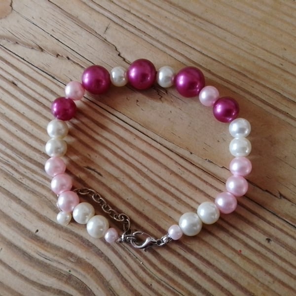 Handmade bracelet made using pre-loved beads.