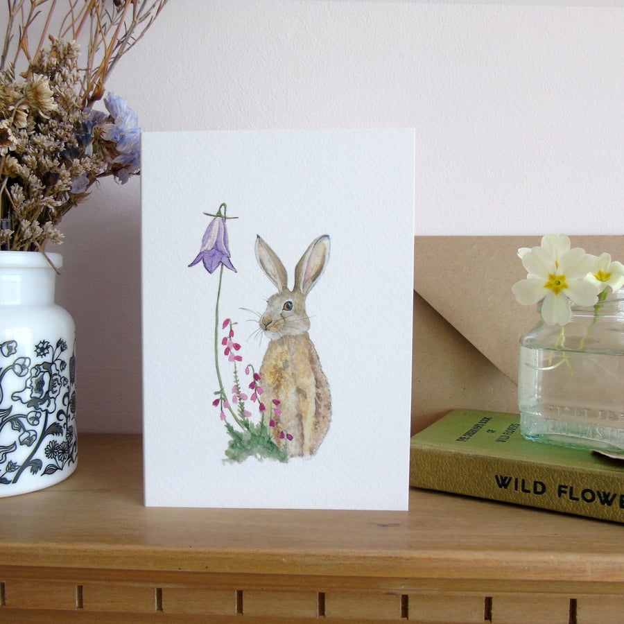 Brown hare and heather Greetings card