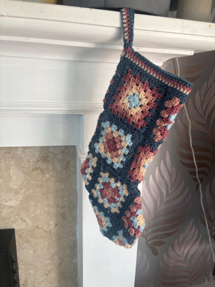 Handmade crochet Christmas stocking with hanging loop. 