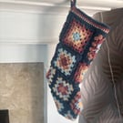 Handmade crochet Christmas stocking with hanging loop. 