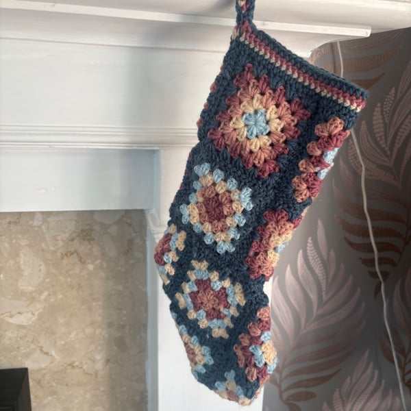 Handmade crochet Christmas stocking with hanging loop. 