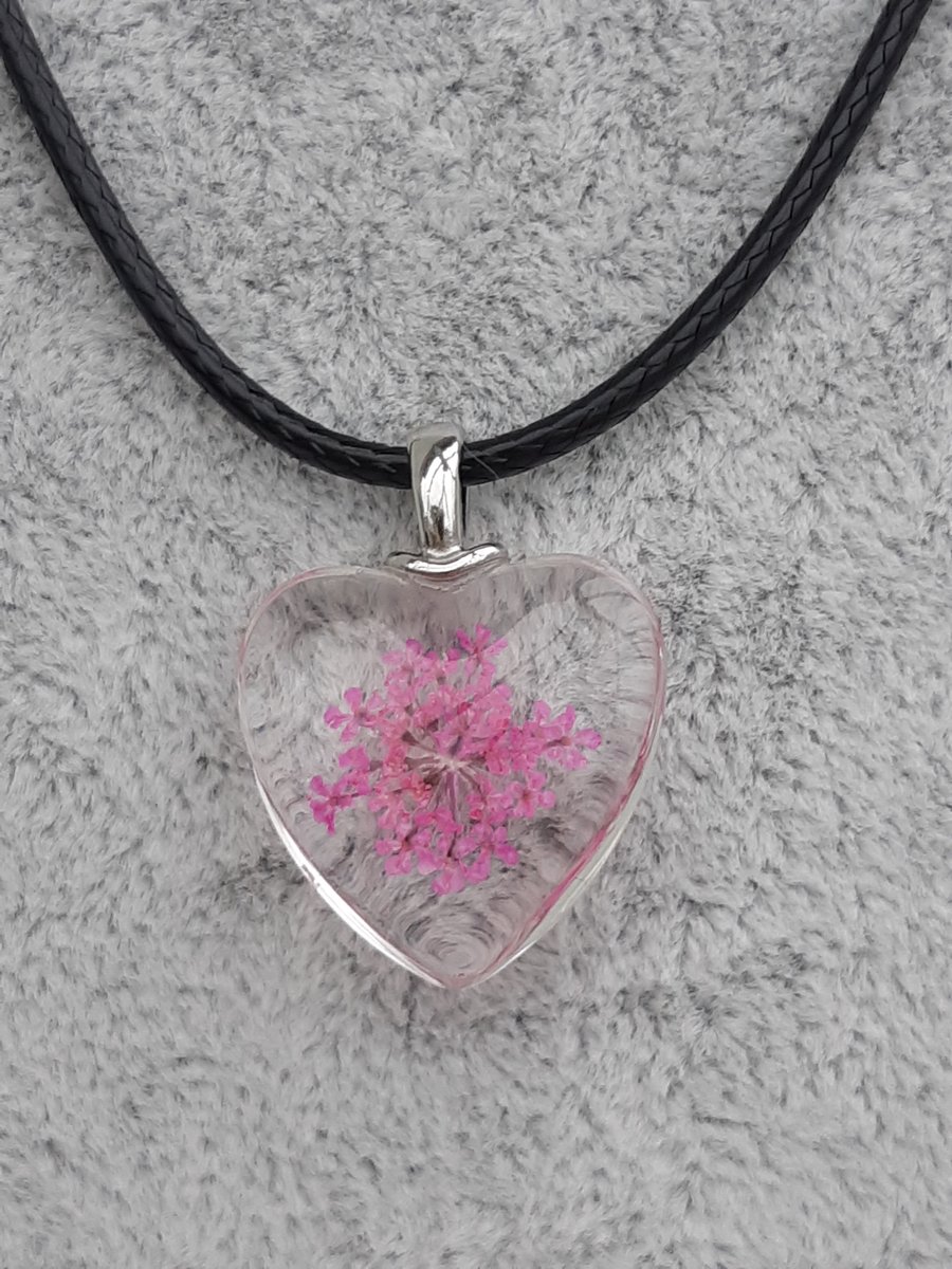Dark pink flower heart pendant on cord