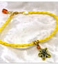 Bracelet Yellow Faux Leather with gold plated Starfish charm bead. - Image 1