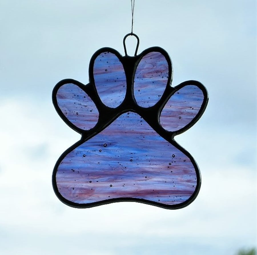 Paw Print suncatcher in blue and purple streaky glass