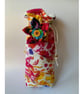 Handmade Quilted Wine Bottle Bag with Fabric Flower Embellishment - Image 3