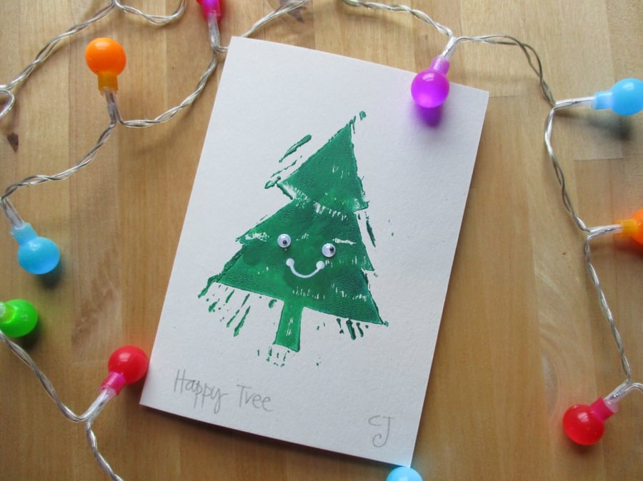 Happy Tree - lino cut print Christmas card with wobbly eyes