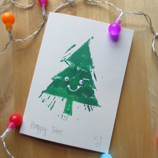 Happy Tree - lino cut print Christmas card with wobbly eyes