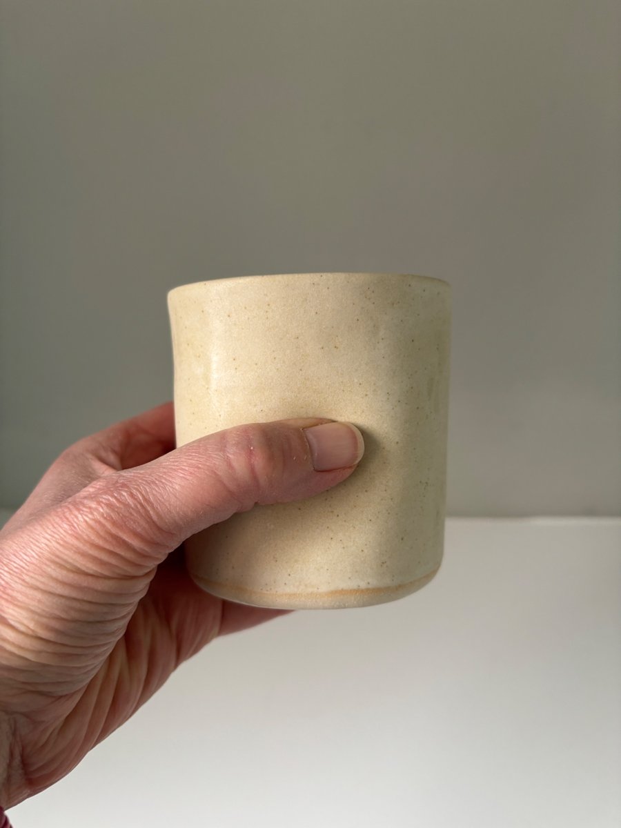 Handmade small ceramic dimple mug, cream handleless mug