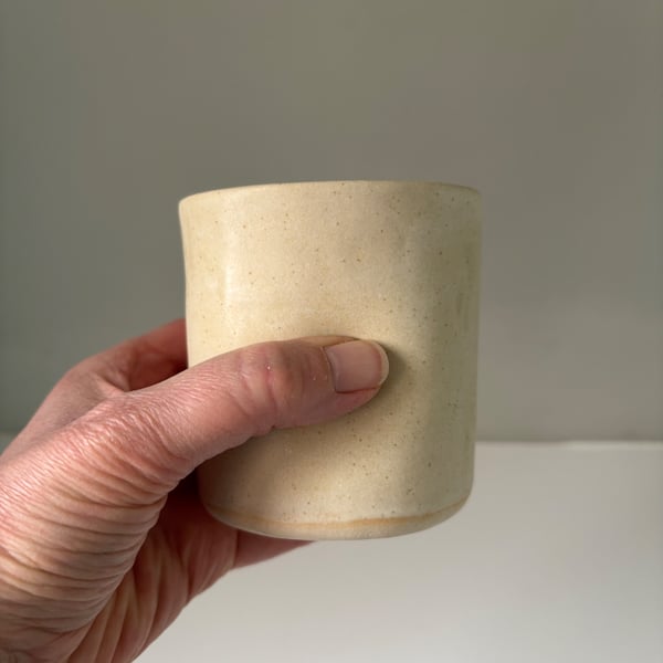 Handmade small ceramic dimple mug, cream handleless mug