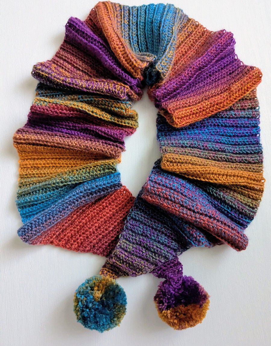 Scarf with pompoms
