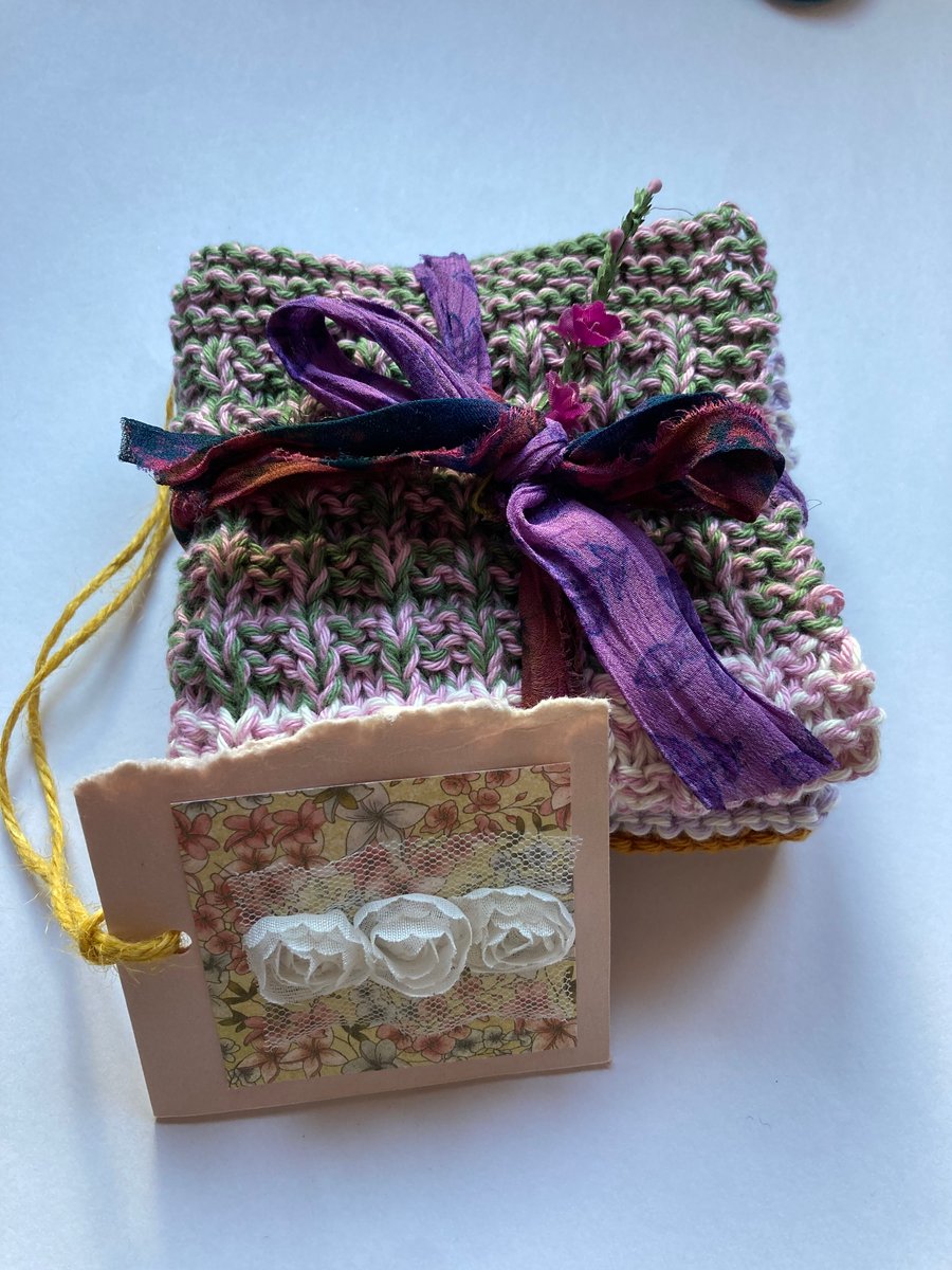 A pair of hand knitted cotton dishcloths