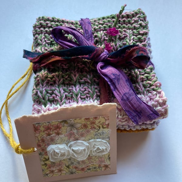 A pair of hand knitted cotton dishcloths