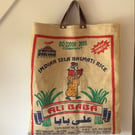 Jute hessian rice sack tote. Repurposed bright print Indian bag