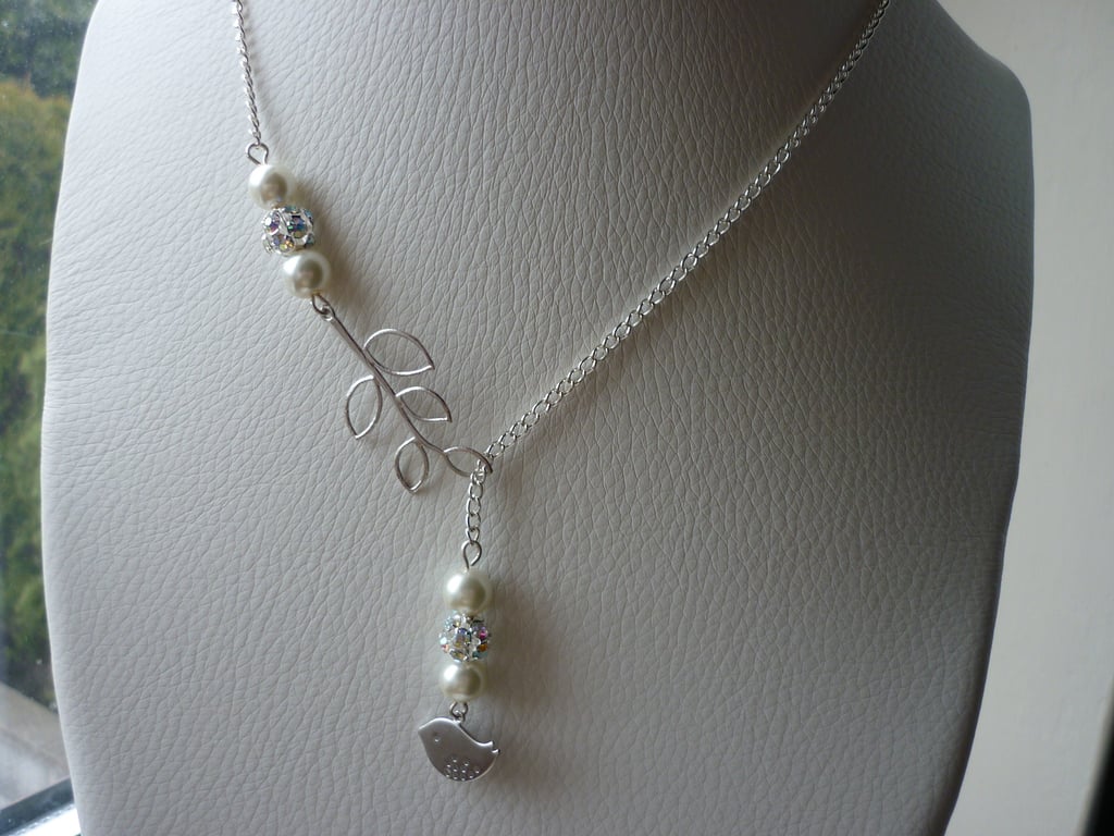 RHINESTONE AND IVORY, BIRD AND LEAF LARIAT DESIGN NECKLACE.  795