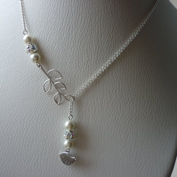 RHINESTONE AND IVORY, BIRD AND LEAF LARIAT DESIGN NECKLACE.  795