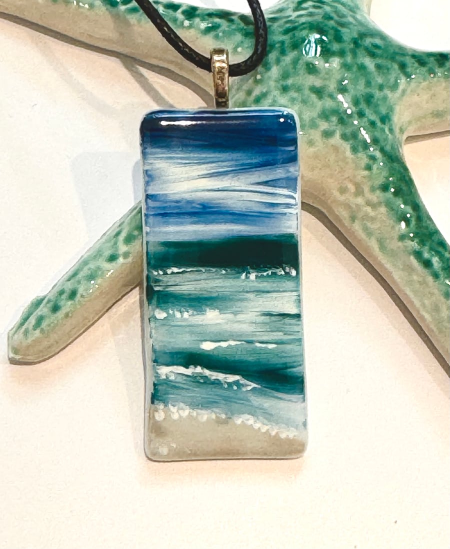 Hand painted enamel & glass seascape pendant 