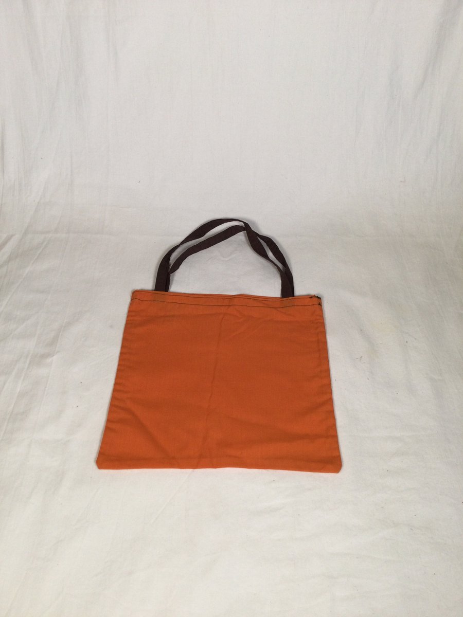 Coloured, reusable, recycled cotton fruit and vegetable shopping bags.