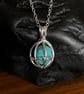 Sterling Silver Cage Pendant Containing Gemstone With Chain