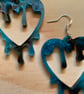 Incredible dripping blue and black heart earrings 