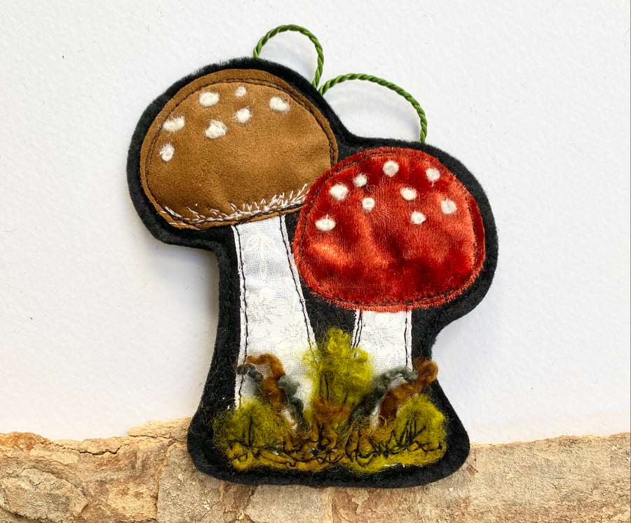 Upcycled embroidered woodland mushrooms home decoration. 