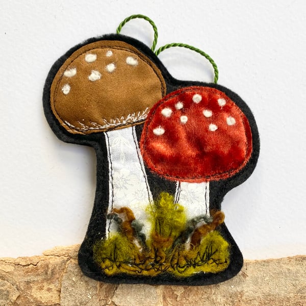 Upcycled embroidered woodland mushrooms home decoration. 