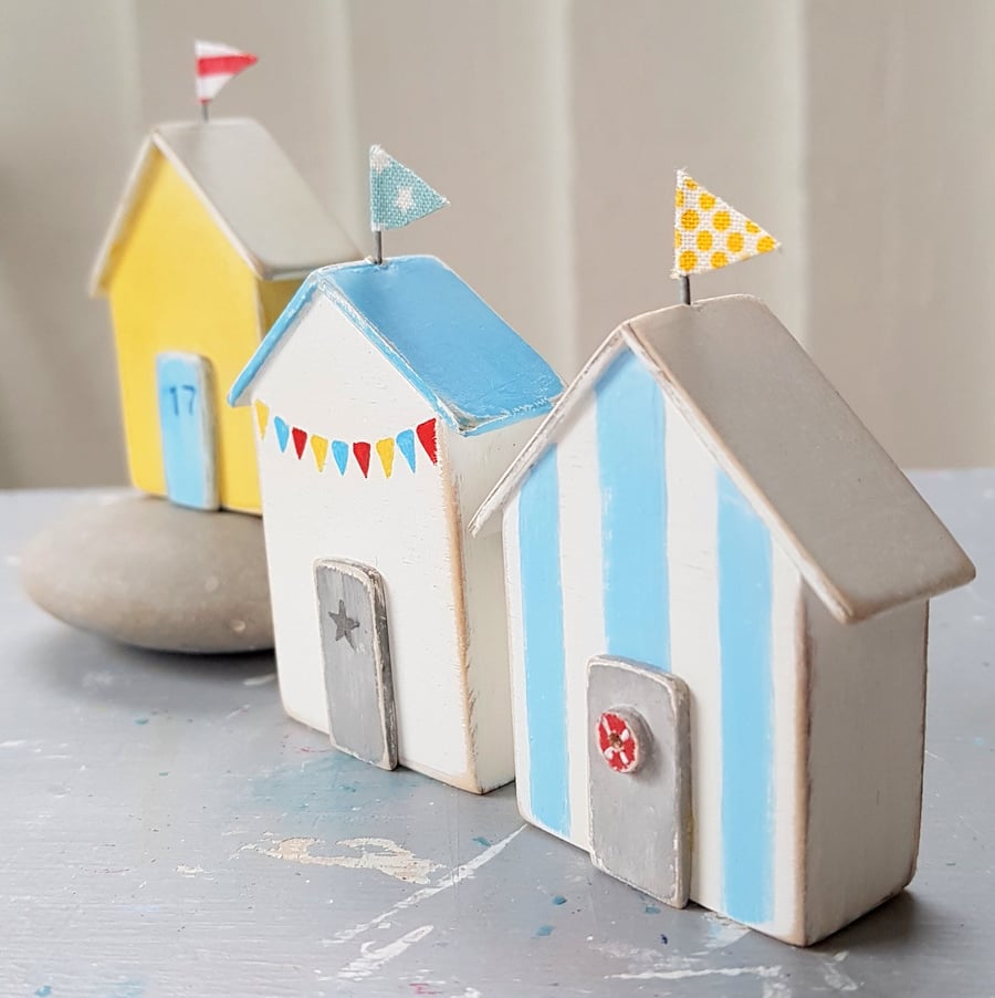 A Row of Wooden Beach Huts