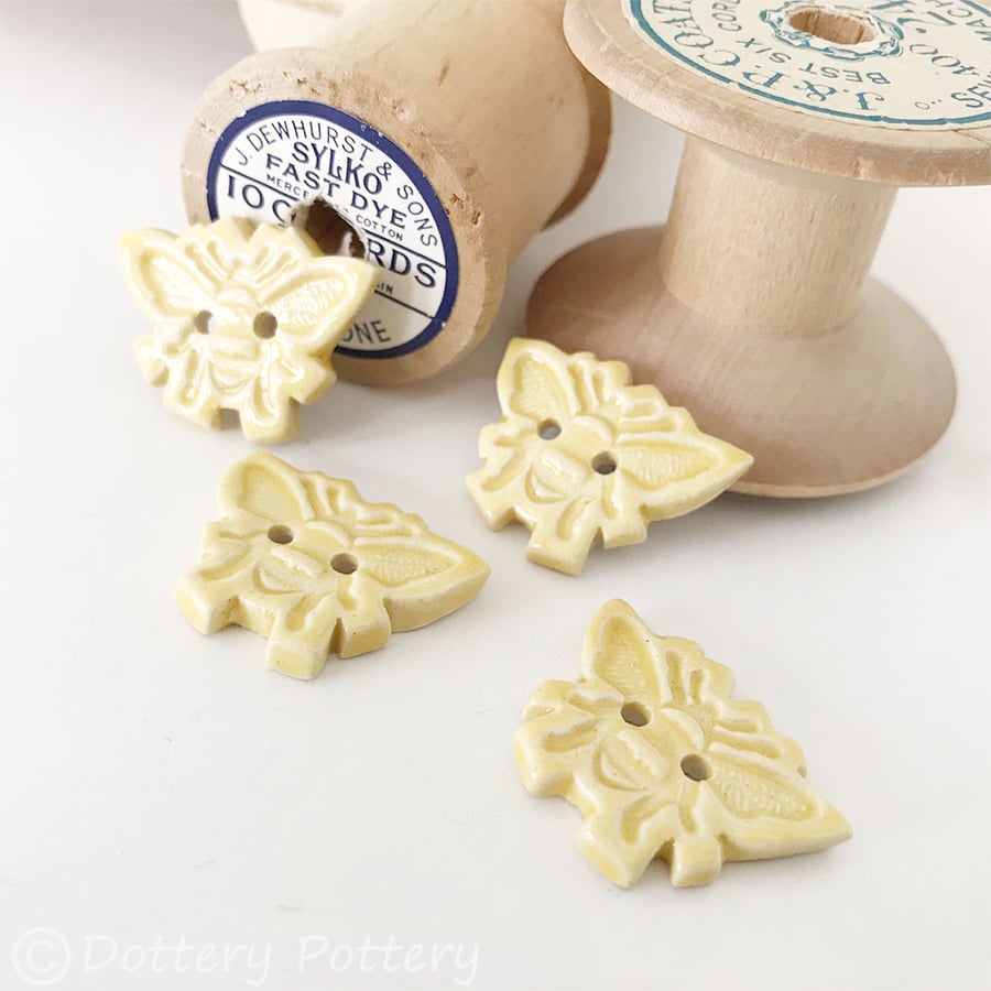 Set of four little ceramic bee handmade buttons