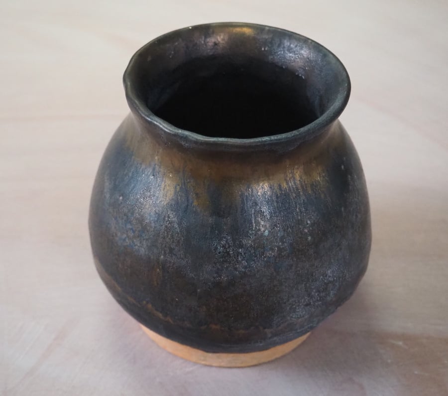 Stoneware pottery vase, antique gold and black effect glaze.