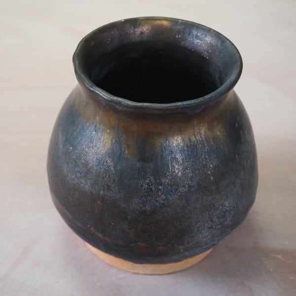 Stoneware pottery vase, antique gold and black effect glaze.